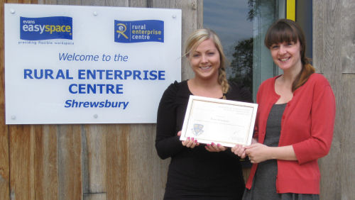 Michelle Jones receptionist on left and Vicky Barnes Centre Manager on right with the award.