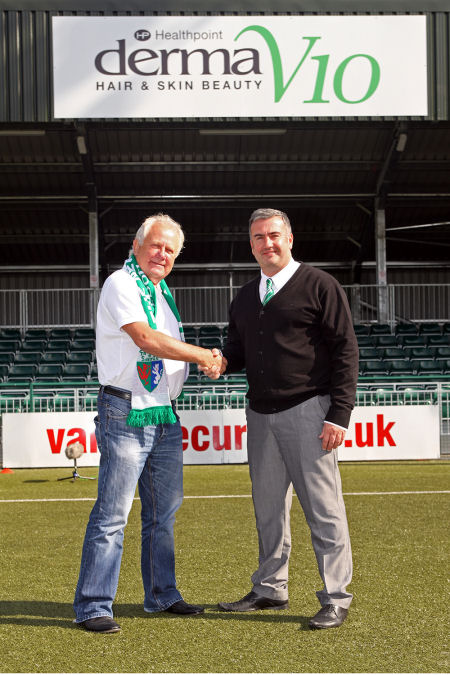 Healthpoint chairman Bob Seddon shakes hands with The New Saints chief operating officer Ian Williams.