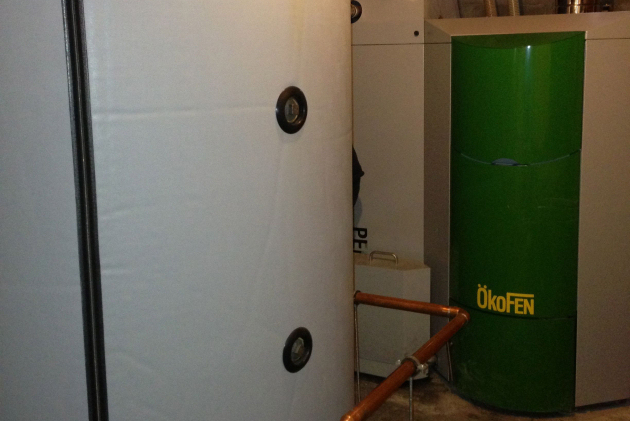 In situ, the 56 kW ÖkoFEN Pellematic wood pellet boiler.