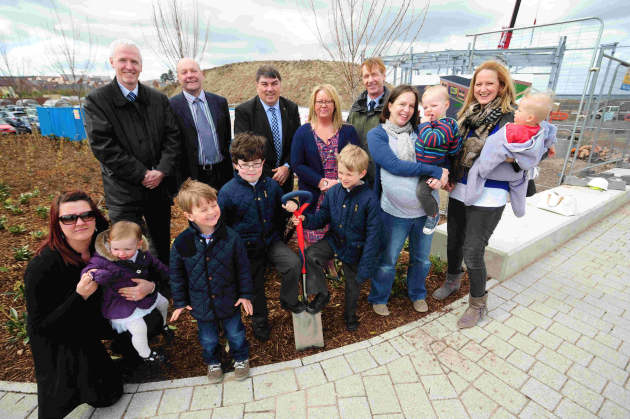 Pictured are John Butler from HSBC with nursery owner Andrea Mitchell, along with Lawley Village developers and prospective children with their parents. On the back row from left to right: Guy Scott, Peter Maddock, John Butler, Andrea Mitchell and Toby Millward.