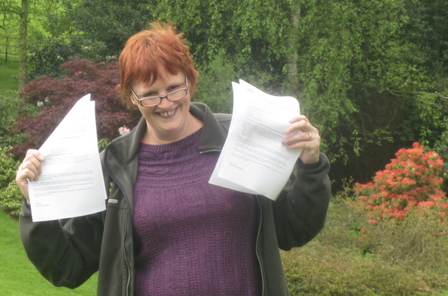 Property Administrator Nikki Hook with entry forms for the competition.