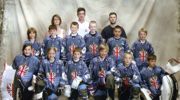 The Great Britain under-10s inline hockey team and their manager and coaches. George Garbett is centre back; Grace Garbett front row second left, Alex Blake front row third right.