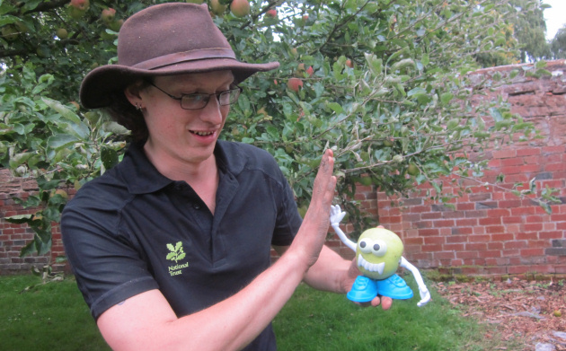 Assistant Gardener, Mark McCormack giving property applehead (Mr. Dudmaston) a hi-five