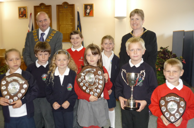 Mayor of Shrewsbury, Cllr Jon Tandy and Mayoress Diane Tandy with award winning local school children.