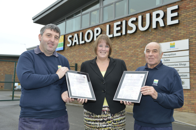 Town clerk Helen Ball presents a certificates of appreciation to Salop Leisure’s groundsmen Clive Akers (right) and Terry O’Shea.