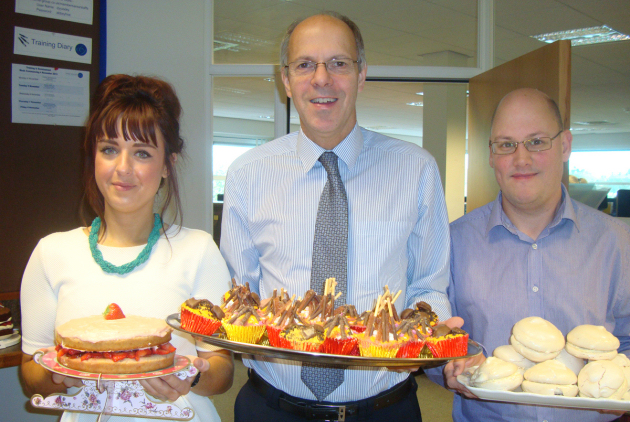 At the Dyke Yaxley cake sale are, from left, Jodi Jones, Laurie Riley and Rob Armitt.