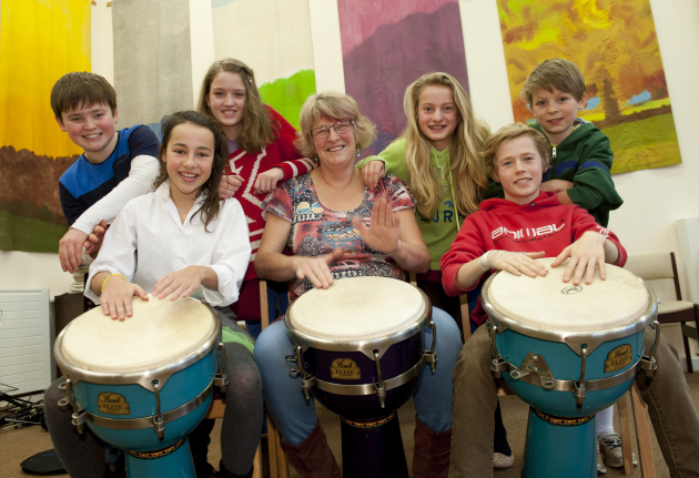 Pictured from left, pupils enjoying the African drumming workshop, Cameron Hughes-Williams; Rosie Davis; Molly Kaye; Mrs Janet Knight (Head of Art); Sophia Dixon; Ben Henderson and Charlie Harpin.