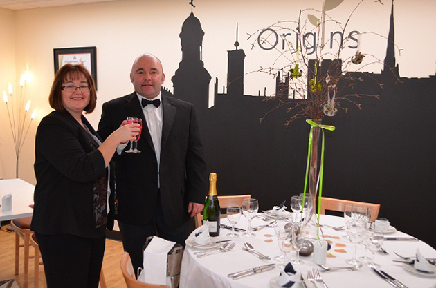 Front of House Hospitality and Catering lecturer Julie Crampton and Origins Restaurant Manager Ted Coxon raise a glass to the launch of the new facility at Shrewsbury College, London Road.
