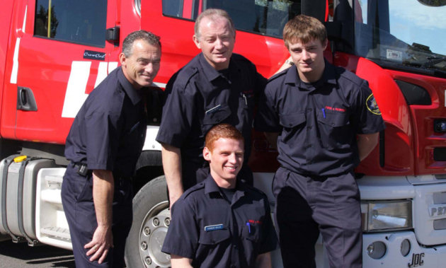 Baschurch firefighting family: Father and son Glenn (centre)and Adam Willis (front), with Connor (right) and his dad Craig. 