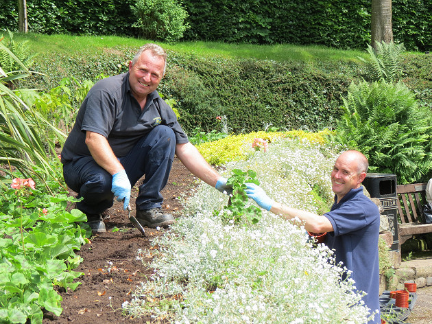 Quarry Foreman, Mark Bowen and Pete Jenks plant out the beds in the Dingle.