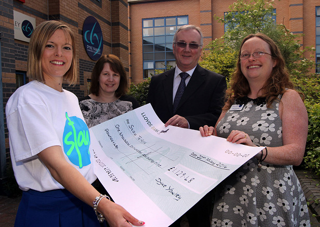 Kay Bennett fund raising and marketing executive for Stay Telford receives the donation from Dyke Yaxley’s Carol Wright, Ian Walsh and Marie Bramwell.