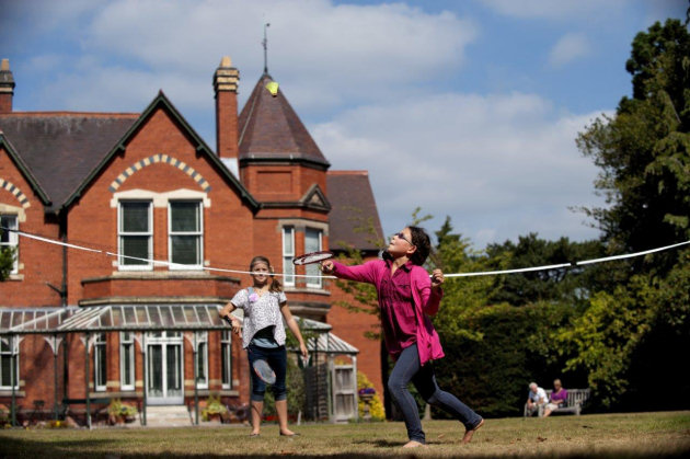 Children carry on the tradition of playing sport on the lawn at Sunnycroft. Photo: National Trust.