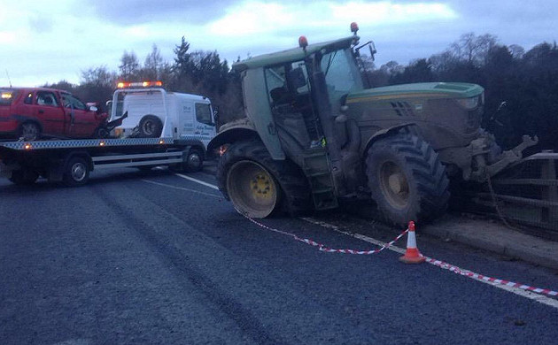 The tractor was left hanging off the side of the bridge. Photo: @Llangollenfire