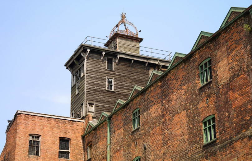 Exterior view looking up at the turret of Shrewsbury Flaxmill Maltings. Photo: English Heritage