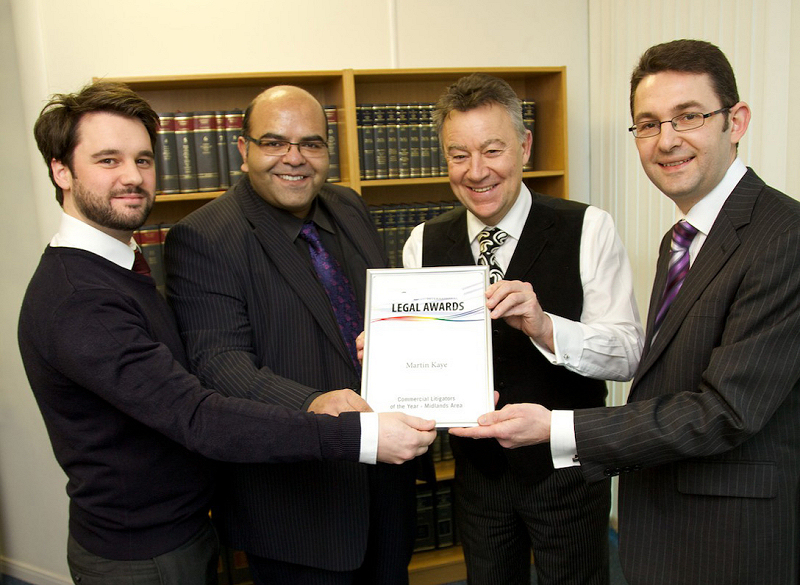 Celebrating their award success at Martin-Kaye are, from left, Jason Round, Mohammed Ahsan, Graham Davies and Andrew Oranjuik