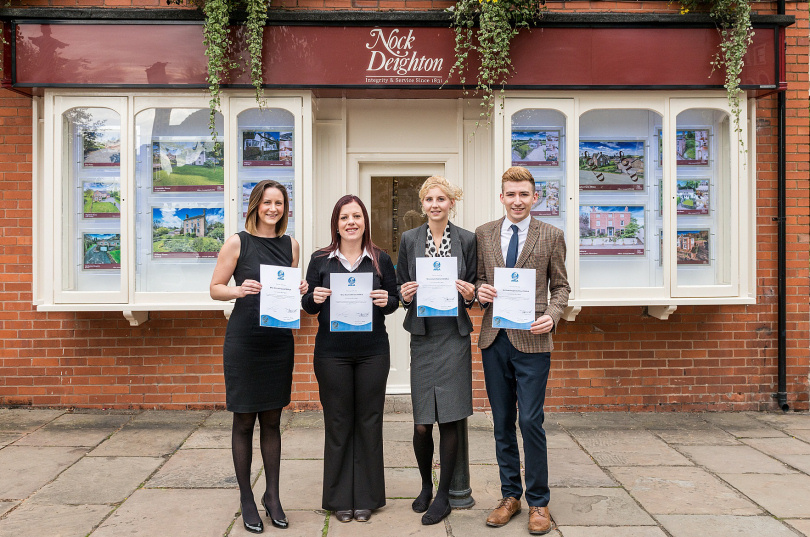 Erica Hinwood, Naomi Williams, Coralie Walrond and Chad Douglas-Colhoun with their certificates outside the Nock Deighton Ironbridge office