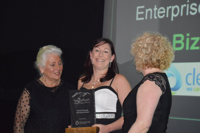 Michelle Childs being presented with her award by Judge Margaret Carter and award partner representative from Cleaner Care