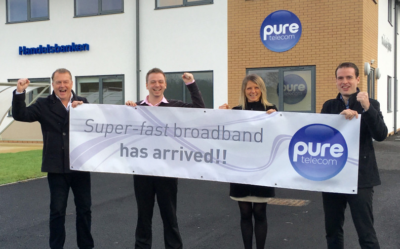 Pure Telecom celebrating the arrival of superfast broadband, from left, managing director Matt Sandford and account managers Liam Baker, Karen Nicholas and Matt Dyke