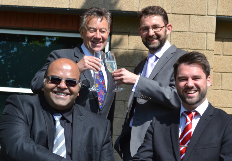 Celebrating their latest award win are, from left, Mohammed Ahsan, Graham Davies, Andrew Oranjuik and Jason Round at Martin-Kaye