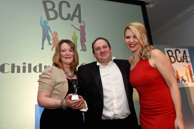 Sally and Stephen Johnson collect the award for the 2016 BCA Children’s Charity from Steff Parker, representing Beaumont Lawrence