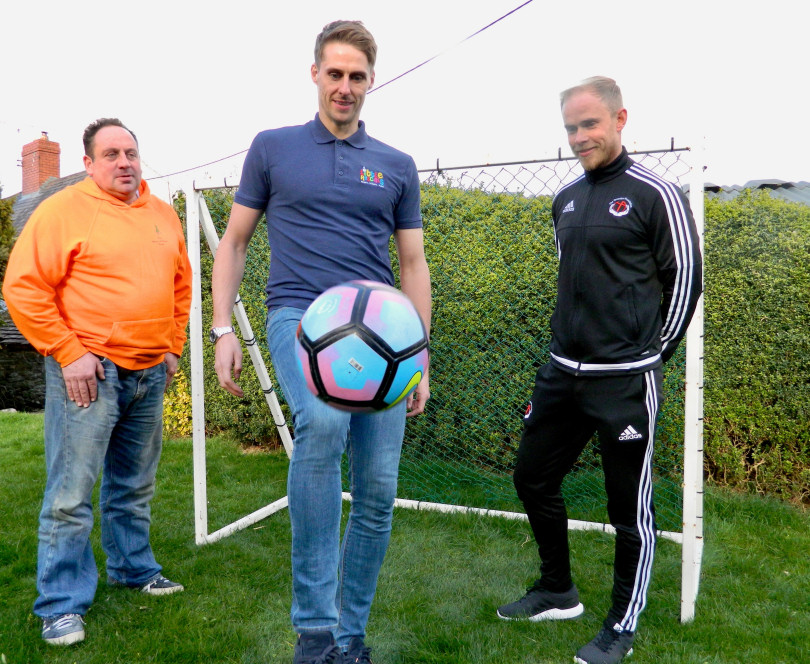 Wales international footballer Dave Edwards, from the Little Rascals Foundation, will be part of the Shrewsbury Town Legends team for the charity match on May 21. He shows his ball skills watched by, left, Stephen Johnson, from the Harry Johnson Trust, and Andy Smith, of the Crossbar Foundation
