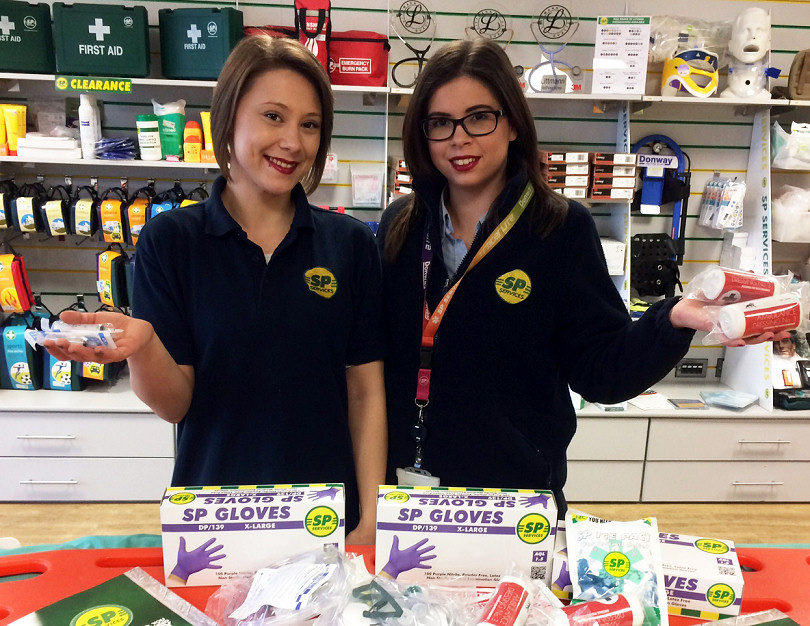 SP Services warehouse assistant Kristina Culver (left) and her sister Lucinda, a showroom assistant, with a small selection of some of the medical aid sent from Telford to Syria