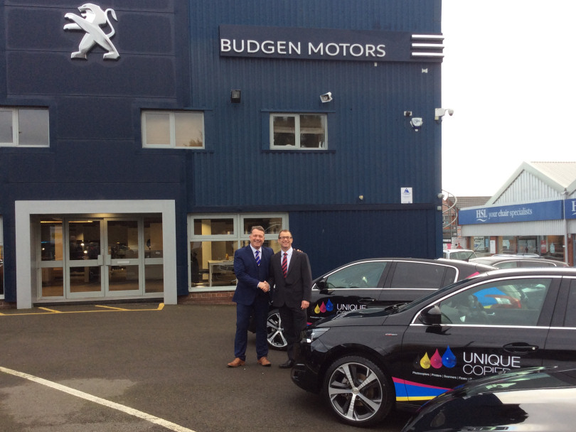 Adrian Casey of Unique Copiers and James Martin  from Budgen Motor Group