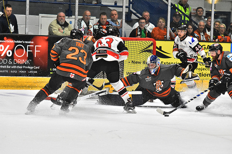 Jon Baston makes a save at full stretch for Telford in the first period tonight. Photo: Steve Brodie