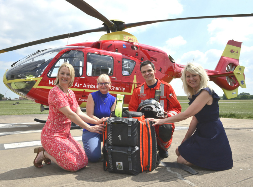 At the Midlands Air Ambulance base are, from left, Julia Allinson, Valerie Sogel of PCP, paramedic Steve Mason and Maria Jones