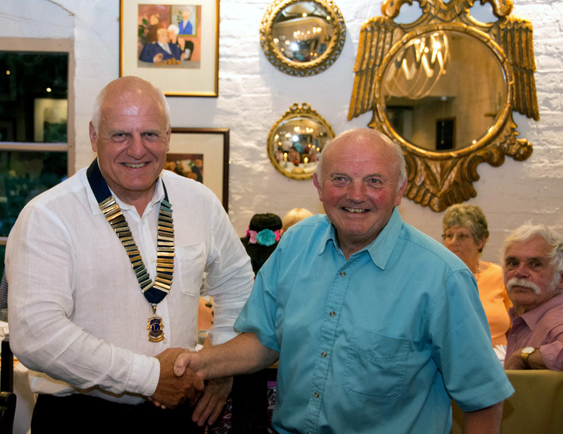 President Charlie Miller (left) and Immediate Past President John Marsh. Looking on far right is Lion Gordon Weston