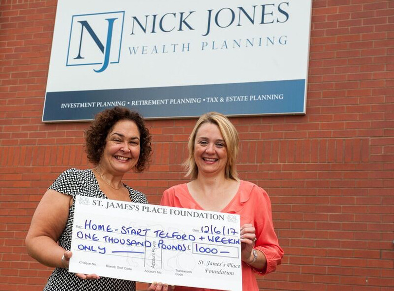 Julia Allinson, Fundraising Manager for Home-Start Telford and Wrekin (right) seen receiving cheque from Chimene Felton Practice Manager for Nick Jones Wealth Planning