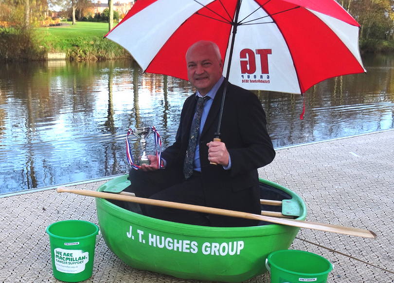 Tudor Griffiths with The Richard Bayliss Cup after TG Group raised £2,000 for Macmillan Cancer Support at the World Coracle Championships