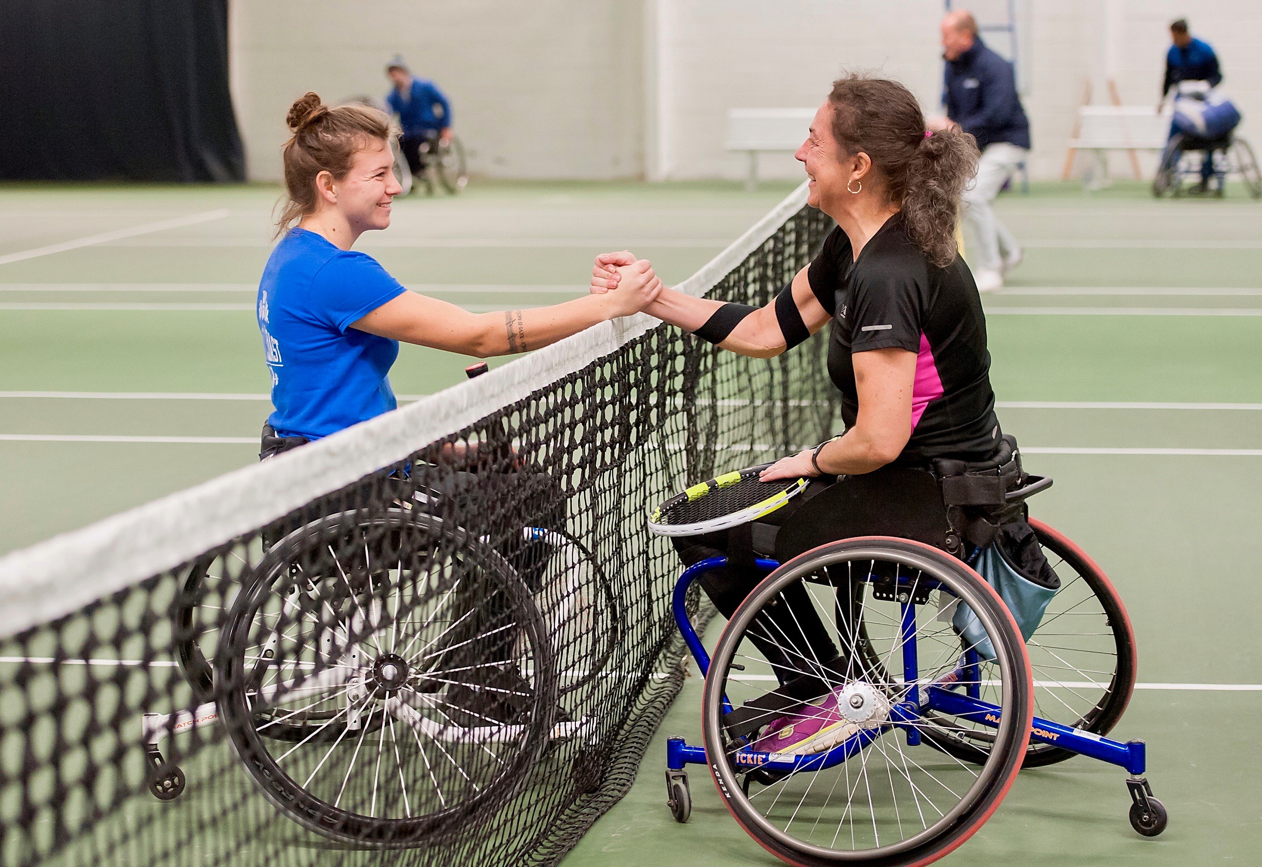 Lauren Jones, left, who made it a hat-trick of national women’s singles titles, is congratulated by local player Deena Webster after completing one of her victories at The Shrewsbury Club last weekend. Photo: Richard Dawson Photography
