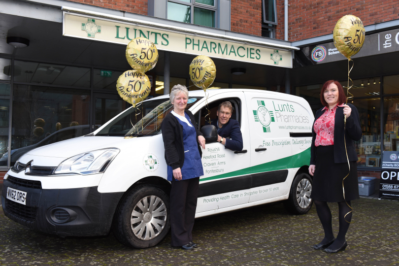 Martin Lunt with Mary Lewis and Lorraine Anderson celebrating the Lunts Pharmacy 50th year