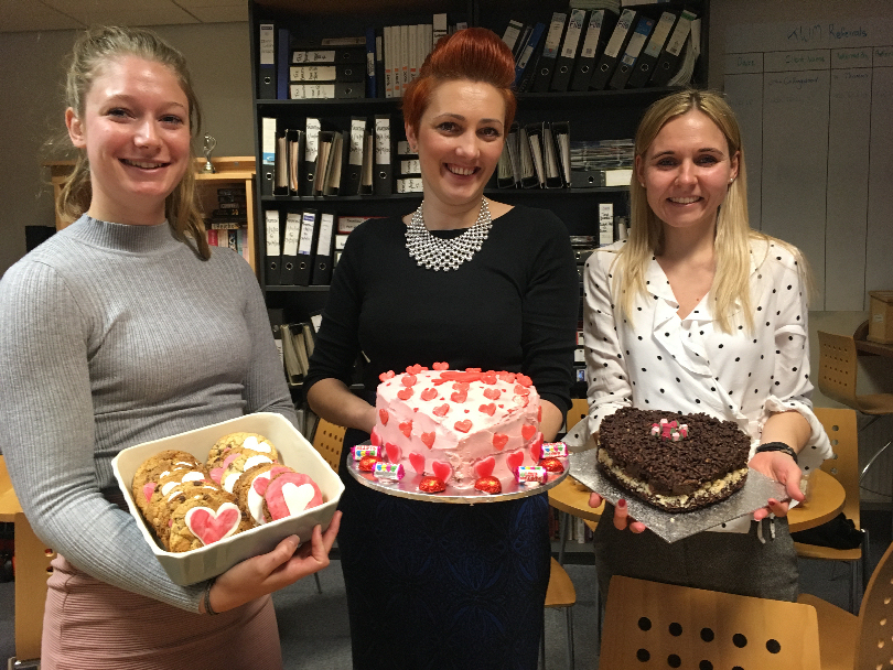 Enjoying the Valentine’s Day bakes are Dani Shimmons, Monika Fogarasi and Sarah Crane