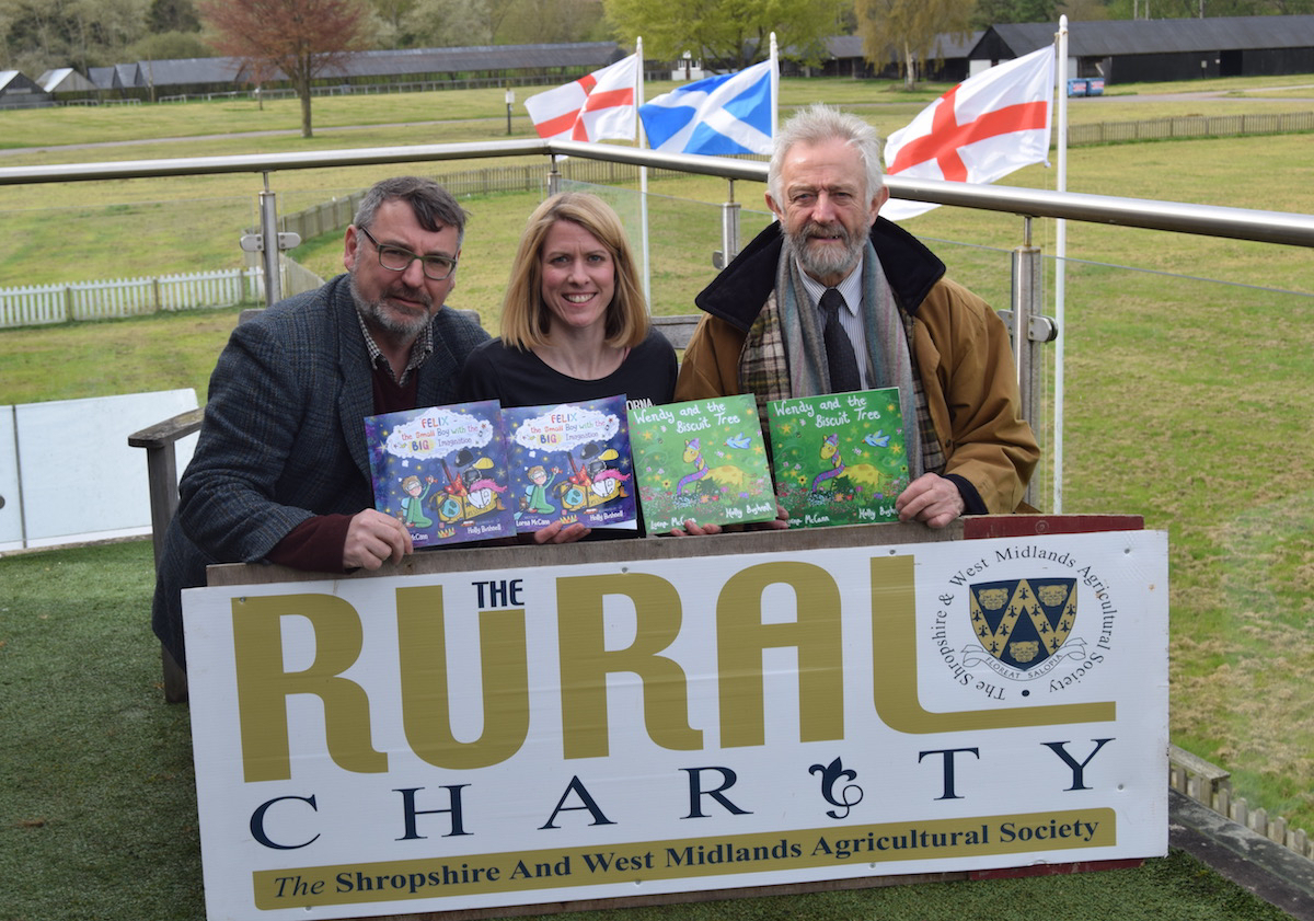 Shropshire author Lorna McCann pictured with Ian Bebbington, Chief Executive of the Shropshire & West Midlands Agricultural Society and Lance Jackson, Society Chairman