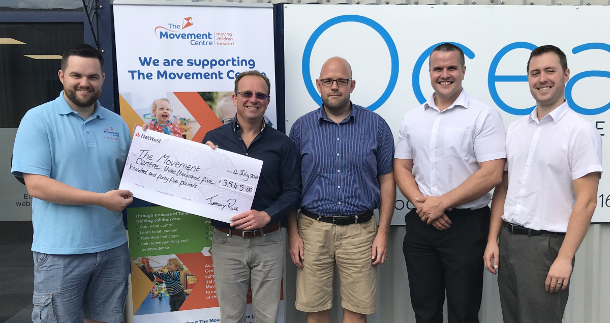 : From left Curtis Langley from The Movement Centre is presented a cheque by Jeremy Rose, managing director at Ocean Telecom with colleagues Simon Calloway, Sean Bolas and Robin Talbot
