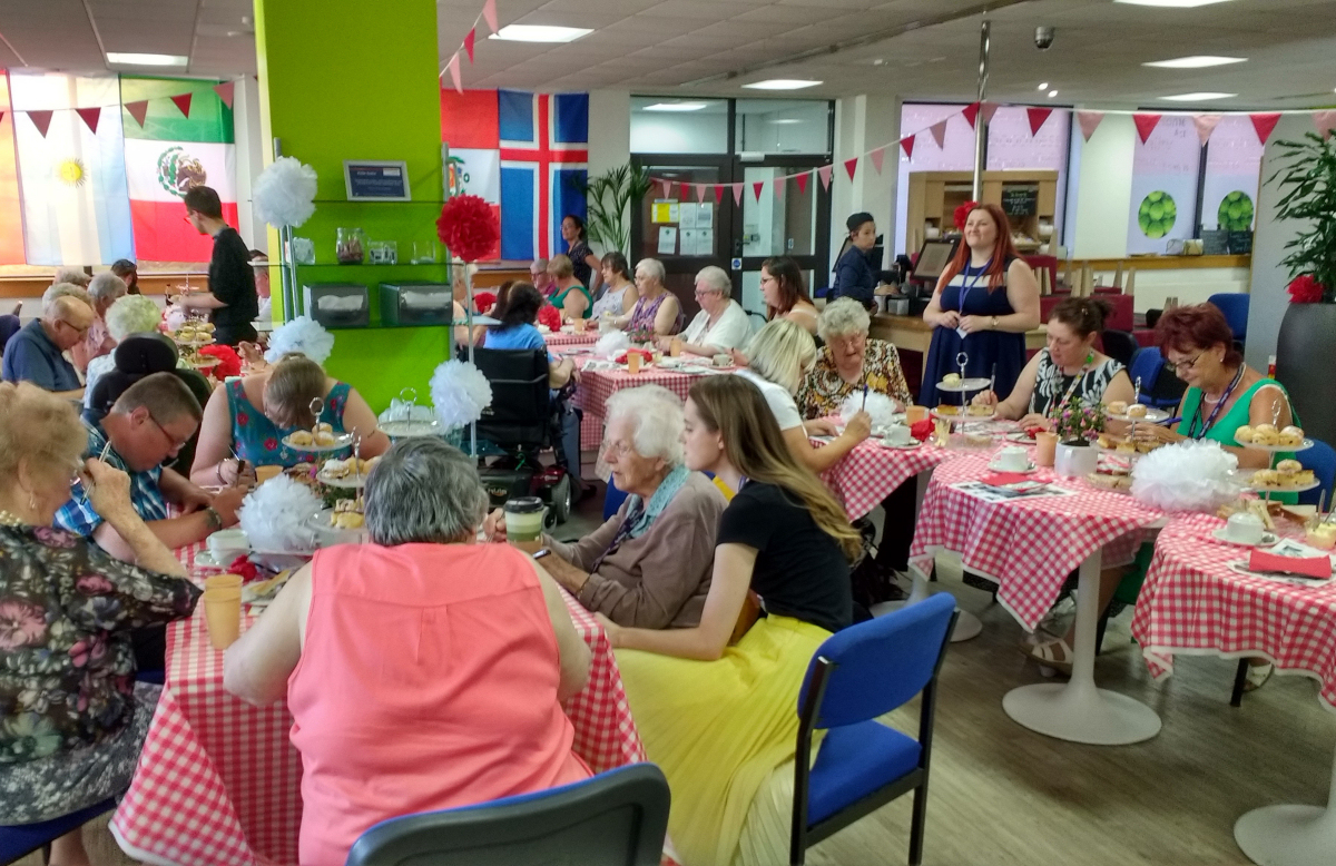 ReAssure employees and members from Age UK Shropshire Telford & Wrekin Day Centres enjoying an afternoon tea