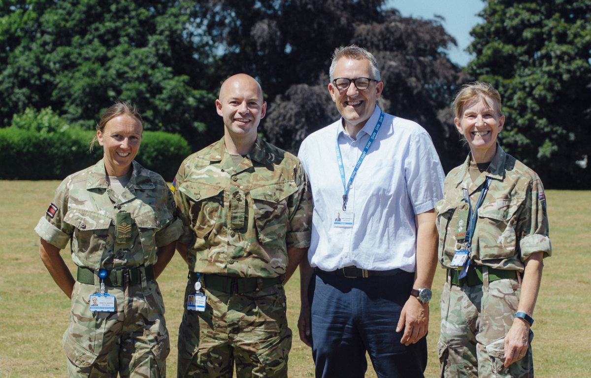 Chief Executive Mark Brandreth with RJAH reservists Rebecca Warren, Louis McDonald and Maggie Durrant. Rebecca and Louis serve with the 202 (Midlands) Field Hospital, while Maggie is Commanding Officer of the Medical Operational Support Group