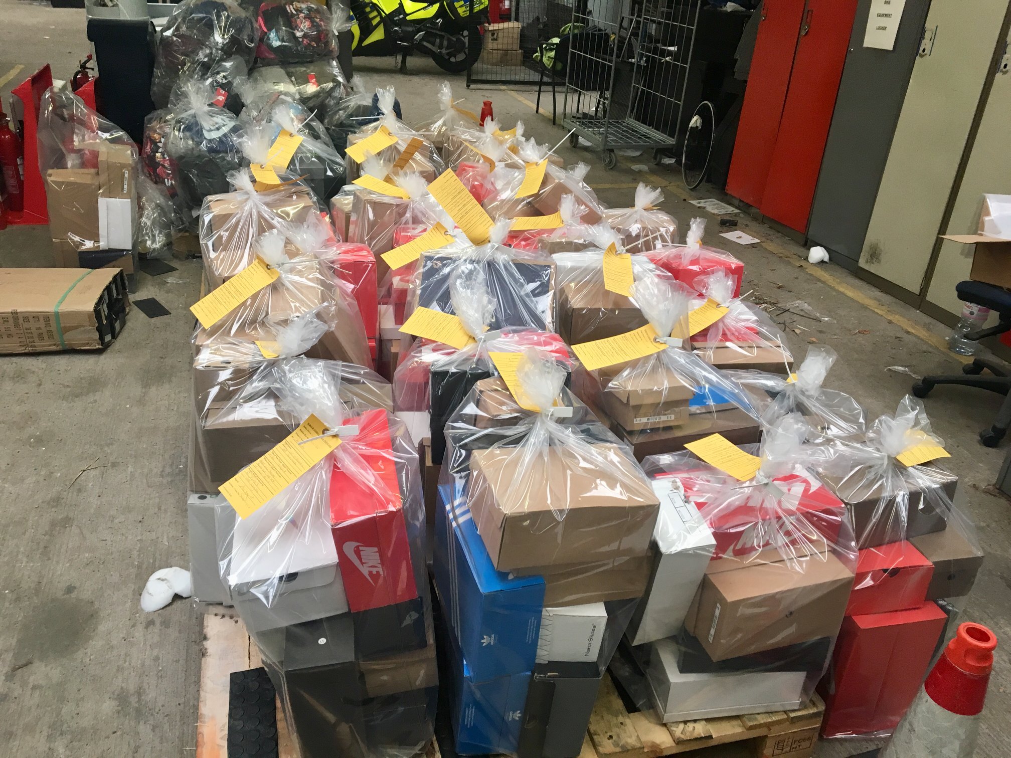 Among the items seized were 400 pairs of trainers, football shirts, jackets, perfumes, hair straighteners and watches. Photo: West Mercia Police