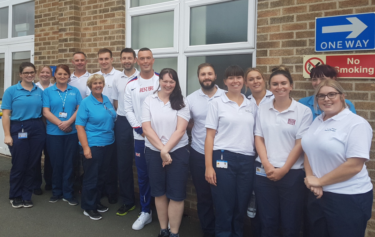 Richard Kilty, centre, with Physio staff at The Robert Jones and Agnes Hunt Orthopaedic Hospital