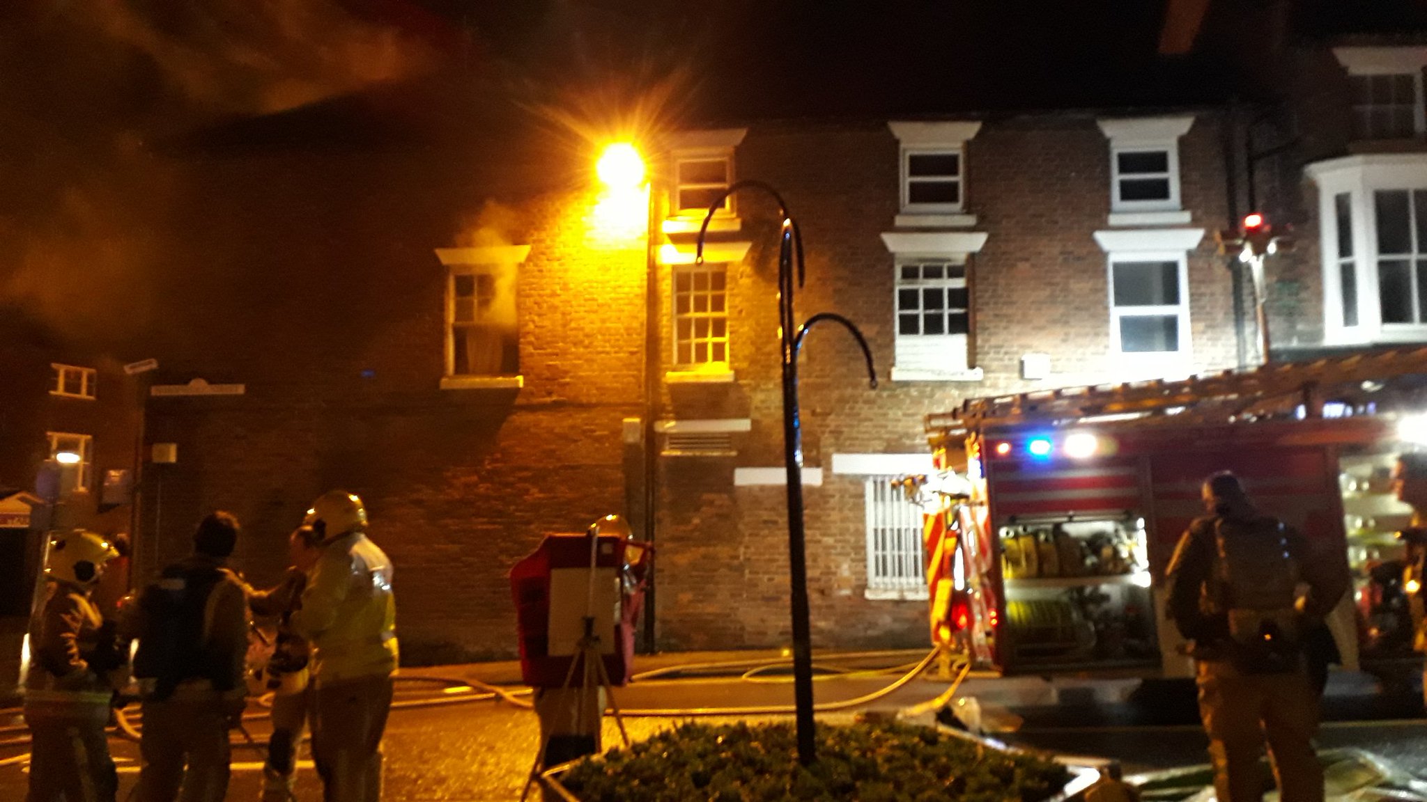 Firefighters at the scene of the fire in Market Drayton. Photo: @SFRS_NGriffiths