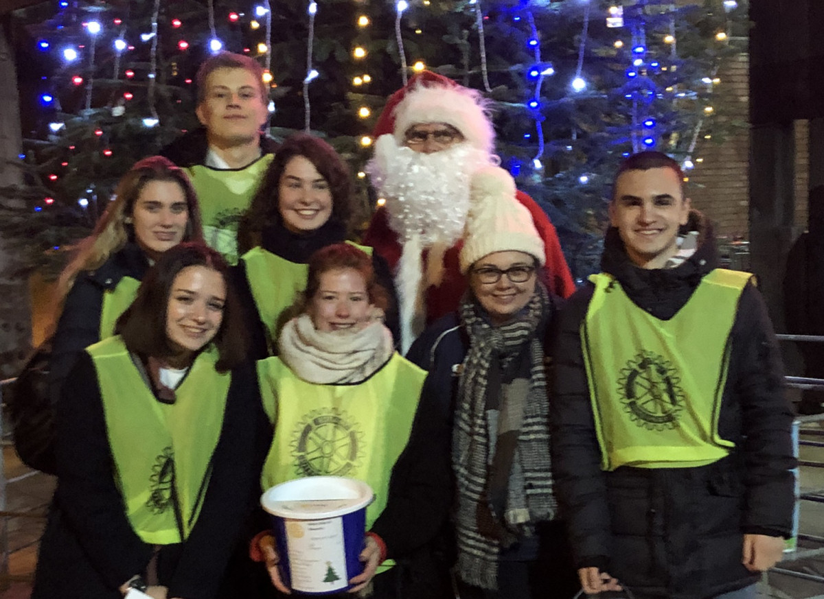 Oswestry School Interact Group from left to right front row. Una Kozic, Anna Holbrook, Suzanne Shooman teacher, Andrei Bahan Interact President. Back row. Beth Williams, Ivan Majic, Meredith Bryson and Father Christmas