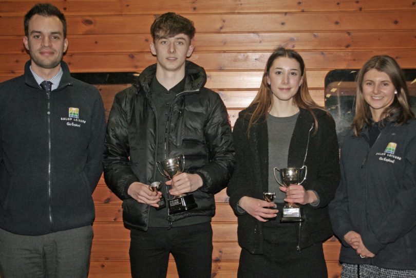 Ed Glover and Laura Wilde of Salop Leisure present trophies to Kati Hulme and Bradley Davies-Pughe, highest ranked Shrewsbury Athletic Club athletes on the UKA Power of 10