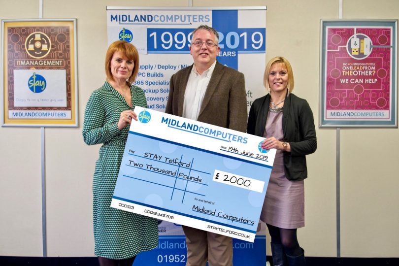 Helen Burton (Stay), Hedley Corcoran (Midland Computers) and Kay Bennett (Stay with the cheque presentation