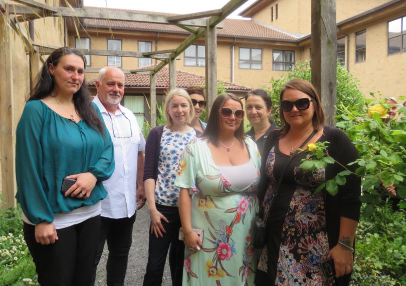 Julie’s family with Pharmacy staff in the Garden of Tranquillity