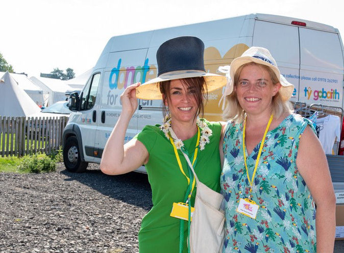 Hope House’s Shrewsbury shop Assistant Manager Samantha Robbins and volunteer Lucy Wall at this year’s Shrewsbury Folk Festival, which has raised more than £70,000 for the charity