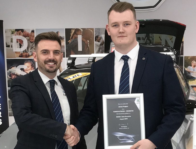 Furrows of Oswestry Sales Manager Daniel Edwards and James Probert with his official Skoda accreditation