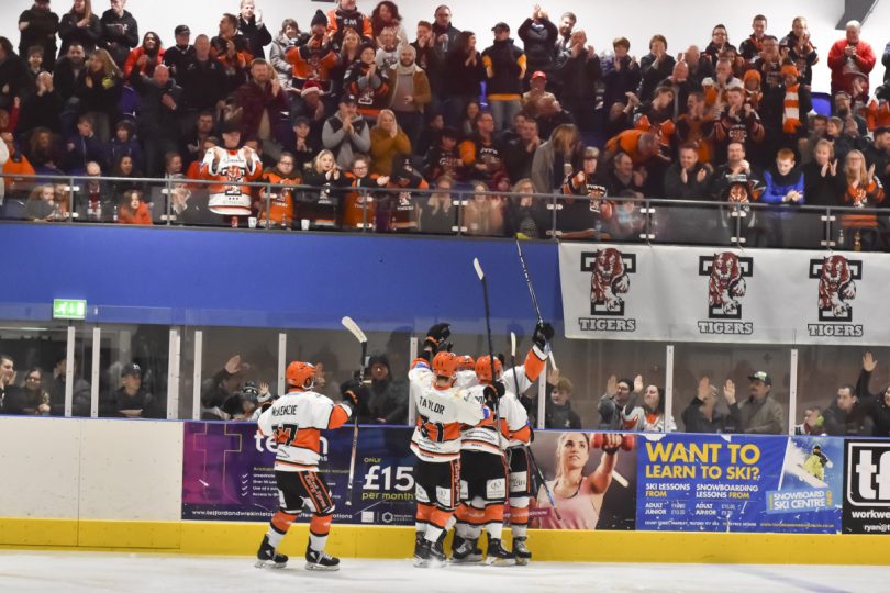 Players and Fans celebrate Tigers opening Goal scored by Andy Mckinney. Photo: Steve Brodie