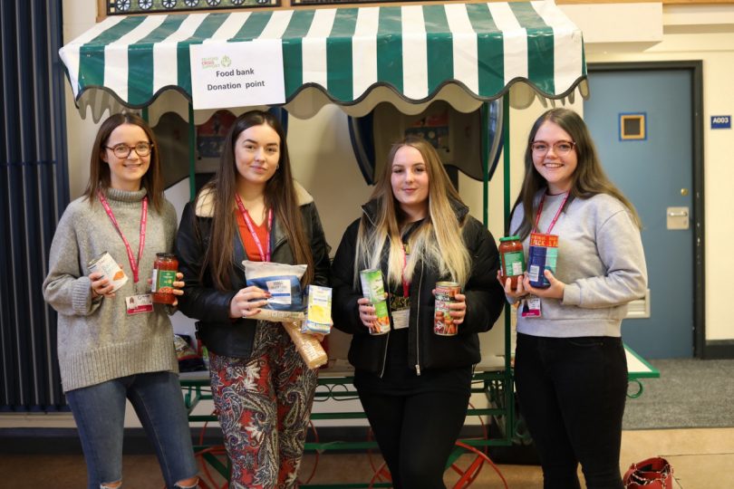 Level three childcare students Lucy Oakley, Tea Evans, Madeline Parton and Mollie Martin at their food bank donation point, at Telford College